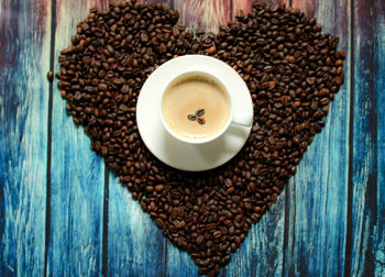 High angle view of coffee cup on table