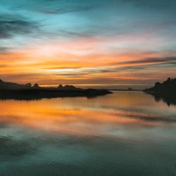 Scenic view of sea against sky during sunset