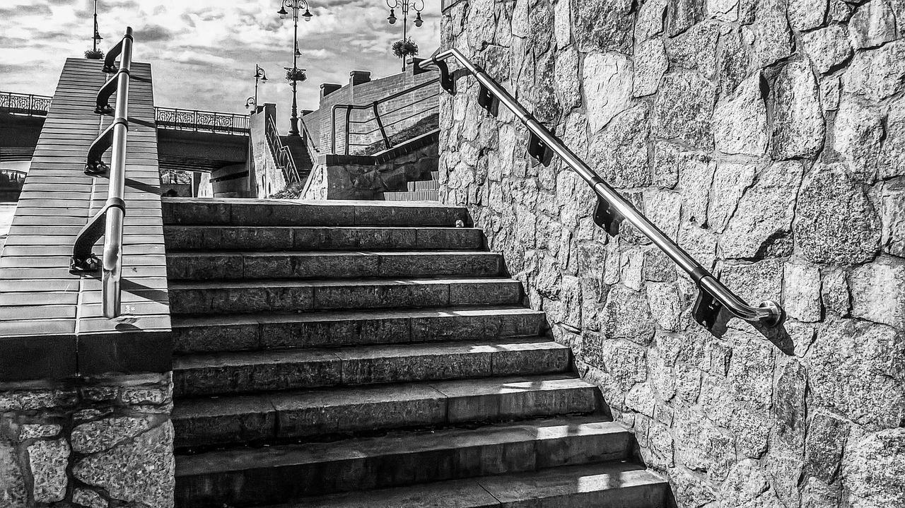 staircase, steps and staircases, architecture, built structure, stairs, black and white, railing, monochrome, monochrome photography, day, building exterior, low angle view, nature, wall, the way forward, no people, outdoors, wall - building feature, black