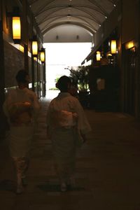 Blurred motion of woman at night