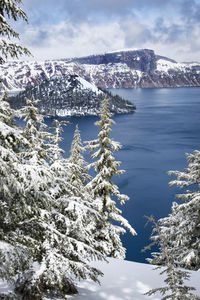 Scenic view of snow covered mountain against sky