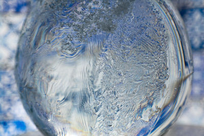 Close-up of bubbles on glass