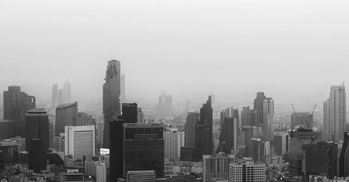 Modern buildings in city against sky