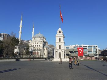 View of historic building against clear blue sky