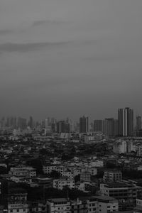 High angle view of buildings in city against sky