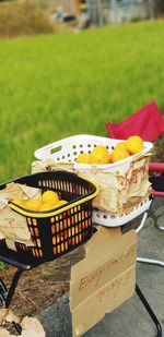 Close-up of fruits in basket on table