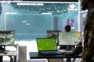 Man using laptop at office