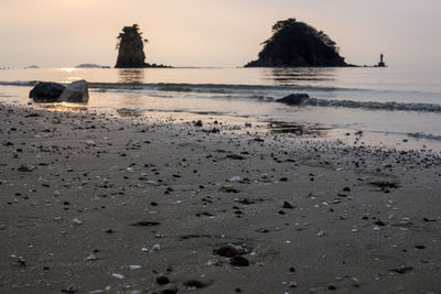 Scenic view of beach against sky