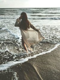 Waves on shore at beach