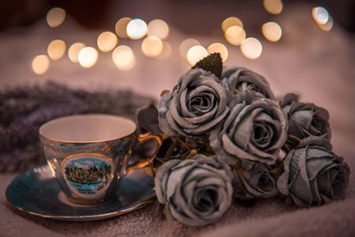 Close-up of rose on table