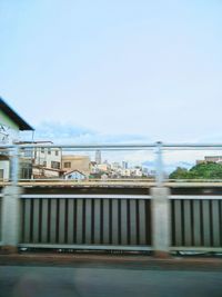 Bridge over sea against clear sky