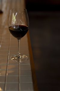 Close-up of wine glass on table