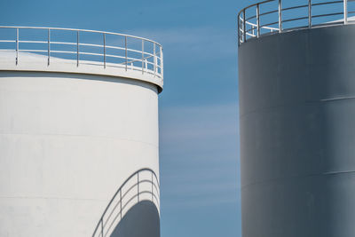 Low angle view of smoke stack against sky