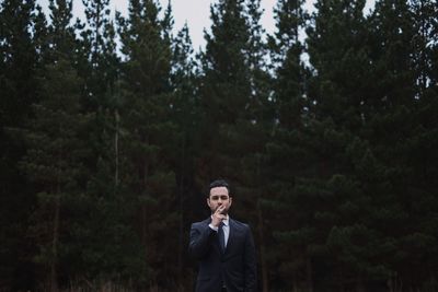 Portrait of young woman in forest