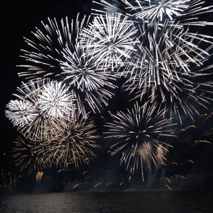 Low angle view of illuminated ferris wheel