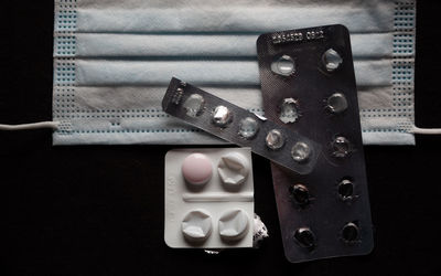 High angle view of mobile phone against black background