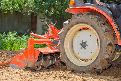 Cultivator for a mini-tractor for loosening the soil. agricultural work. excavation. close-up.