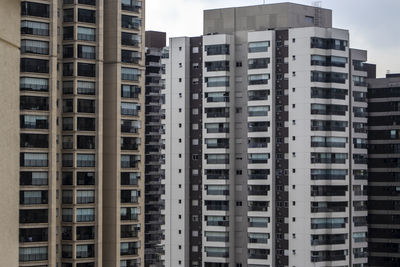 The exterior of modern condominiums is used full of glass,  in brazil