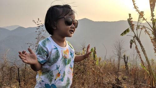 Full length of a woman wearing sunglasses