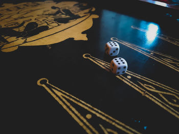 High angle view of guitar on table