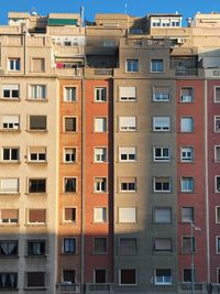 Low angle view of building with window pattern