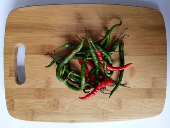 High angle view of red chili peppers on table