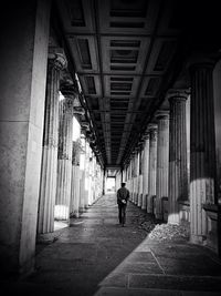 Full length of woman walking on walkway