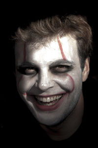 Close-up portrait of a smiling young man