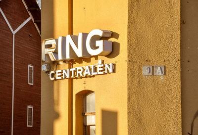 Information sign on wall of building