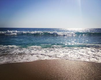 Scenic view of sea against clear sky