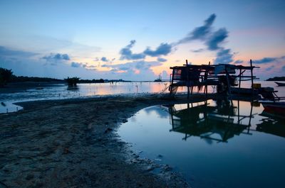 Scenic view of sea against sky at sunset