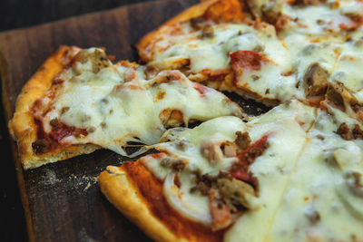 Close-up of pizza on cutting board