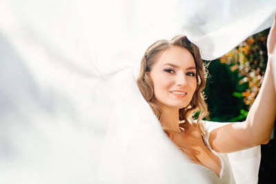 Portrait of smiling young woman