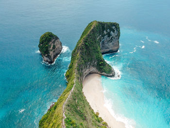 Aerial view of rock formation on sea shore