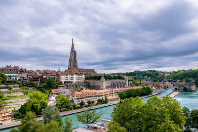 View of buildings against cloudy sky