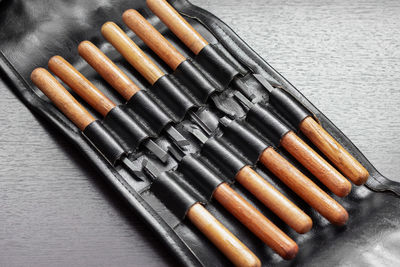 High angle view of make-up brushes on table