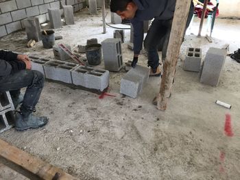 Low section of man working at construction site