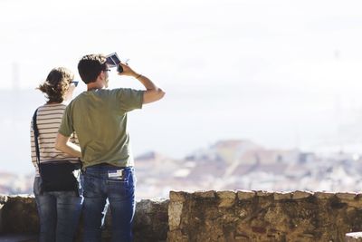 Woman photographing through camera