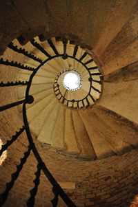 Low angle view of spiral staircase in building