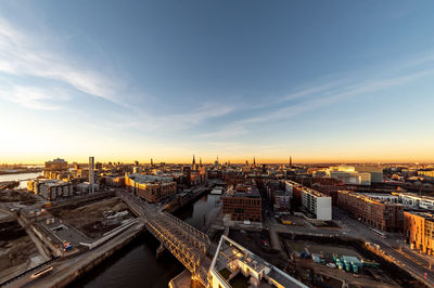 High angle view of cityscape against sky during sunset