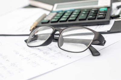 Close-up of eyeglasses on table