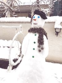 Close-up of statue against snow during winter
