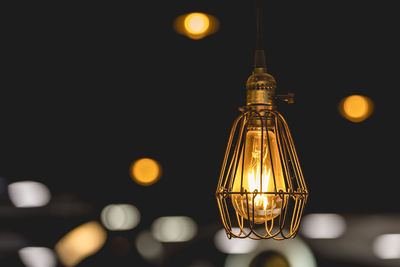 Low angle view of illuminated light bulb