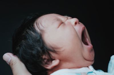 Close-up portrait of cute baby sleeping