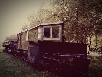 Abandoned train against sky