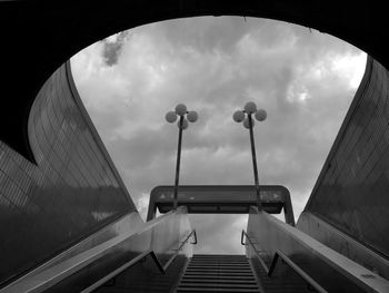 Low angle view of empty staircase against sky