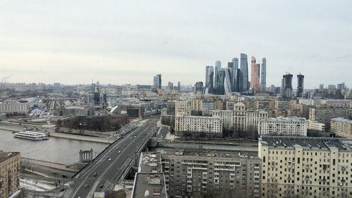 High angle view of buildings in city against sky