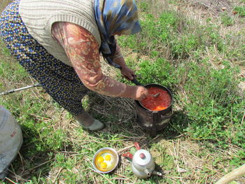 High angle view of man working on field