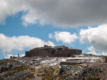 Low angle view of old building against sky