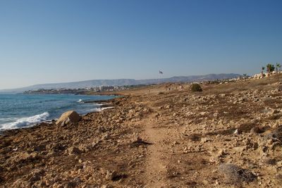 Scenic view of sea against clear blue sky